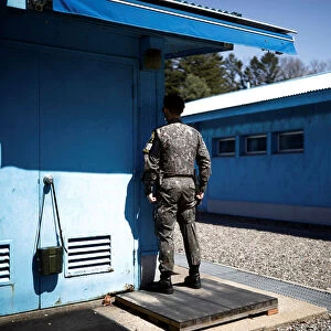 A South Korean soldier stands guard at the truce village of Panmunjom