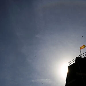 A Spanish flag is seen on top of an apartment building under construction in Madrid