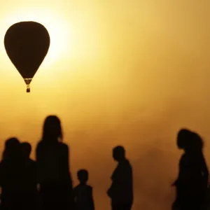 Spectators look at contestants competing in the National Ballooning Championship Spectators look at contestants competing in the National Ballooning Championship