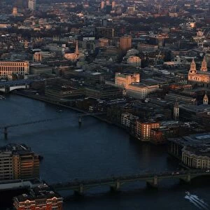 St Pauls cathedral is lit by the early morning sun in an aerial view taken from The