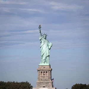 The Statue of Liberty is pictured with no people surrounding her base in New York