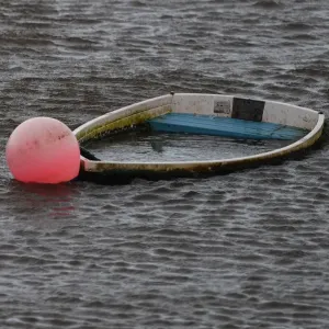 A sunken boat is seen half submerged after Storm Eleanor in Galway Bay A sunken boat is seen half submerged after Storm Eleanor in Galway Bay