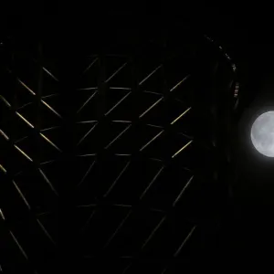 A super moon is seen next to Tokyo Sky Tree, the worlds tallest broadcasting tower at 634 metres
