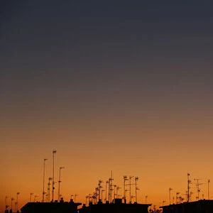 Television antennas are seen on the roof of buildings in the Andalusian capital of