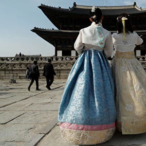 Tourists dressed in traditional Korean costumes visit the Gyeongbokgung Palace in Seoul