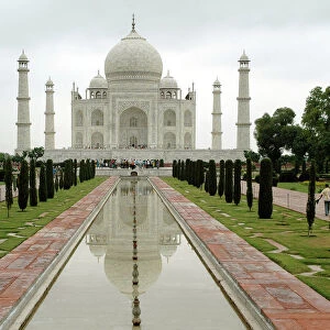 Tourists visit the Taj Mahal in Agra