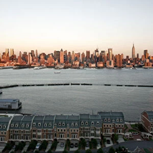 Townhouses on the Hudson River in Weehawken, New Jersey are pictured across from New York