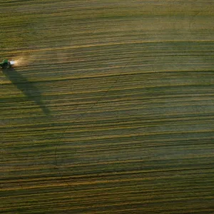 A tractor travels in a field near Donana Natural Reserve, southwest Spain A tractor travels in a field near Donana Natural Reserve, southwest Spain