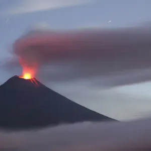 The Tungurahua volcano spews molten rock and large clouds of gas and ash, south of Quito The Tungurahua volcano spews molten rock and large clouds of gas and ash, south of Quito