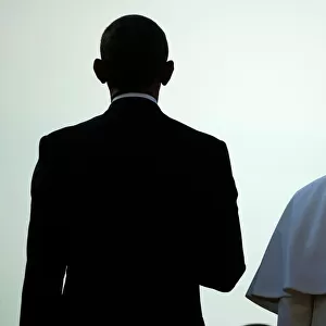 U. S. President Obama stands with Pope Francis during an arrival ceremony at the White