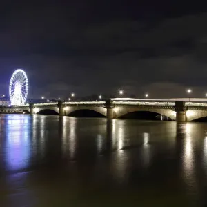 A view shows the Pont de la Concorde bridge, the Grande Roue de Paris A view shows the Pont de la Concorde bridge, the Grande Roue de Paris