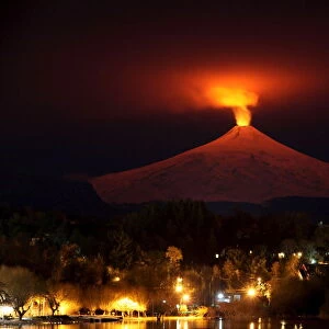 The Villarrica Volcano is seen at night from Pucon town
