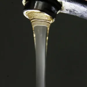 Water flows from a tap in Kiev Water flows from a tap in Kiev