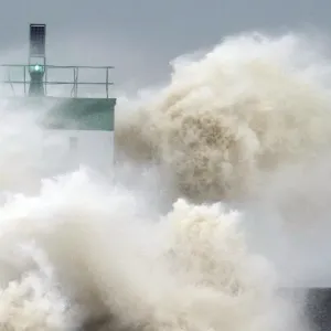 A wave breaks near the lighthouse in Biarritz, southwestern France A wave breaks near the lighthouse in Biarritz, southwestern France