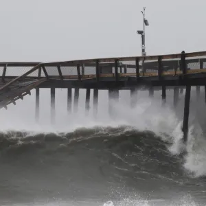 Waves break along the pier which was damaged during Hurricane Irene, in Ocean City Waves break along the pier which was damaged during Hurricane Irene, in Ocean City