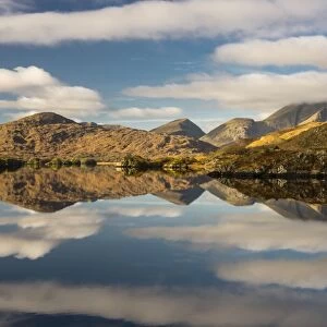 View of mountains and clouds reflected in lake, Upper Lake, Lakes of Killarney, Killarney N. P