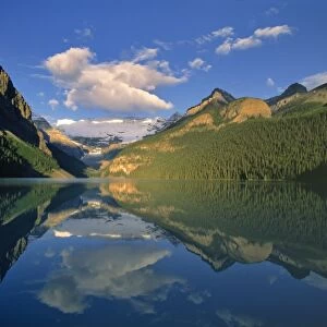 Canada, Alberta, Lake Louise. Victoria Glacier reflects in the mirror-like waters of Lake Louise