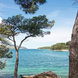 Croatia, Hvar Island, Stari Grad. Picturesque waterfront spot for bench