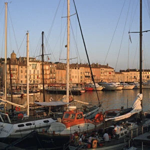 Europe, France, St. Tropez Ships in port and city skyline