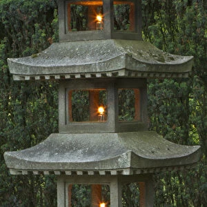 Illuminated stone pagoda lantern in Portland Japanese Garden