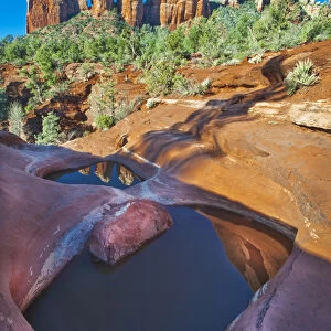 USA, Arizona, Sedona. Water pools in rock
