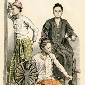 Burmese women and a spinning wheel
