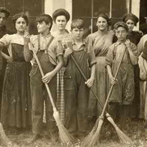 HINE: CHILD LABOR, 1911. A group of young sweepers and doffers in the filling spinning