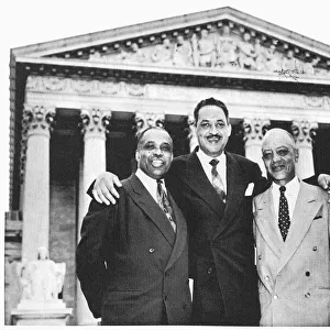 Left to right: NaCP attorneys George E. C. Hayes, Thurgood Marshall and James Nabrit, Jr. celebrate their victory in the Brown vs. the Board of Education case at the Supreme Court in Washington, D. C. 17 May 1954