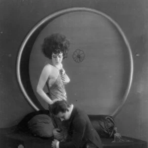 RUDOLPH VALENTINO (1895-1926). American (Italian-born) film actor. Valentino and Alla Nazimova in a scene from the film Camille, 1921