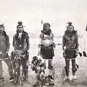 SIOUX DANCERS, 1890. Five grass dancers in ceremonial clothing, probably participants