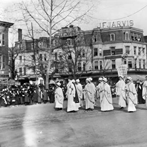 SUFFRAGE PARADE, 1913. Women of the National Woman Suffrage Assocation at the
