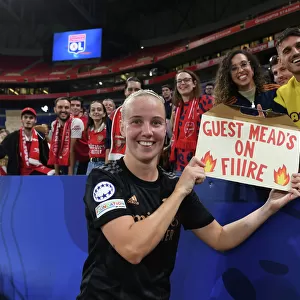 Arsenal Women's Champions League Victory: Beth Mead Celebrates with Fans after Olympique Lyonnais Match