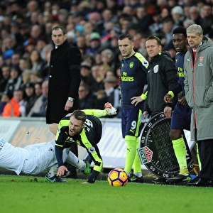 Arsenal's Ramsey Fouls by Swansea's Fer: Wenger and Team React