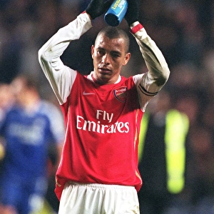 Gilberto (Arsenal) claps the fans at the end of the match