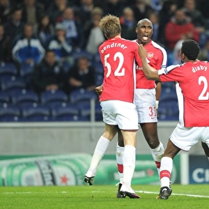 Sol Campbell celebrates scoring the Arsenal goal with Nicklas Bendtner and Abou Diaby