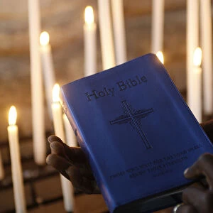 Bible and church candles