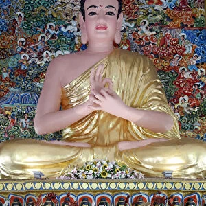 Ho Phap buddhist temple. Buddha statue. Vitarka mudra : symbolizes the Wheel of the Teaching. Vung Tau. Vietnam