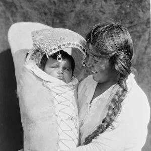 Native American Indian Achomawi mother and child, 1923. Photograph by Edward Curtis (1868-1952)
