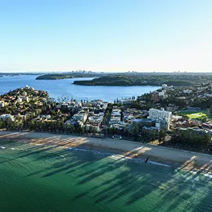 Manly beach and a distant Sydney skyline