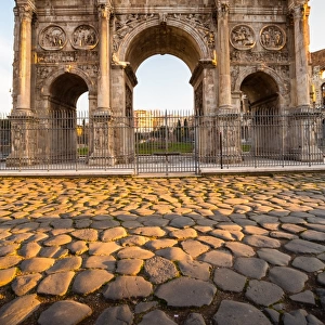 The Arch of Constantine at sunrise in Rome, Italy