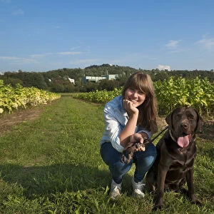 Girl with her Labrador, Ringsheim, Baden-Wurttemberg, Germany