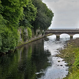 Glenarm River and bridge at Glenarm castle in County Antrim, Northern Ireland