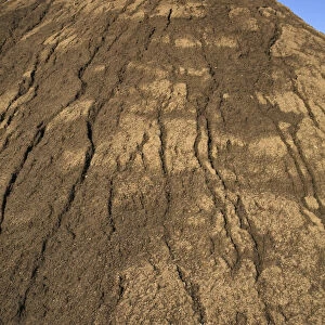 Mound of sand in a commercial sandpit after a heavy rainfall, Quebec, Canada
