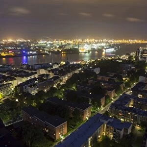 Night view of Hamburg harbor with jetties, Hamburg, Germany