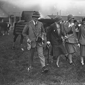 At the Uttoxeter races, Mr Andrew Knowles ( left ) and Miss Cynthia Fielden ( right