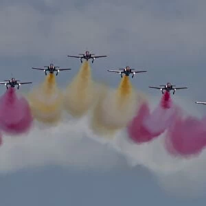 Planes of the Spanish Aguila Patrol perform during the Motril International Air Festival in Motril