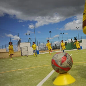 Young players of the Ronda Union Deportiva football club take part in a training