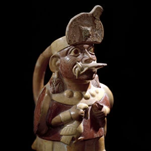 Anthropomorphic vase depicting a priest sacrifying two animals, 200-700 (ceramic)