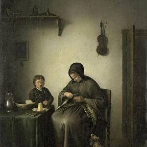 A Woman Slicing Bread Interior home woman cutting bread seated