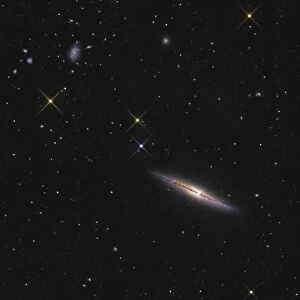 NGC 4013 is an edge-on unbarred spiral galaxy in the constellation Ursa Major